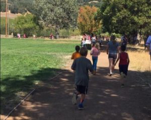 Kids Running on Track